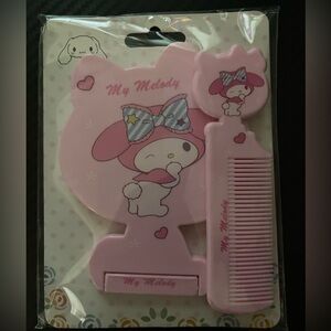 Melody pink mirror and comb